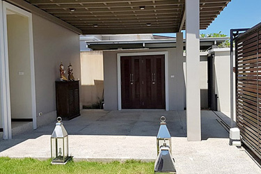 Carport, Small Front Garden and Villa Entrance